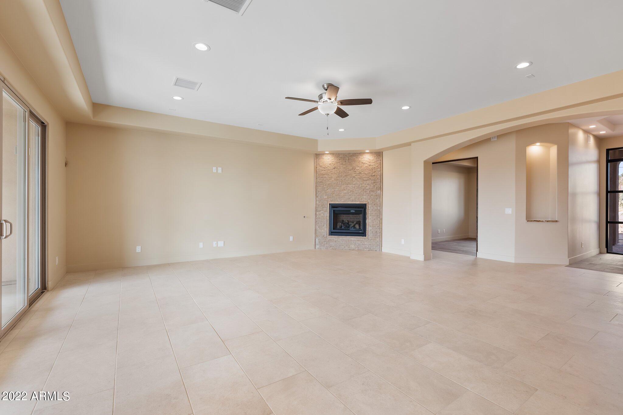 1315 West Irvine Road Phoenix, AZ 85086 - Photo 5 of 34 Great Room with Cozy Fireplace