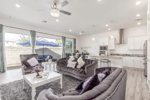 a kitchen with sink stove and cabinets
