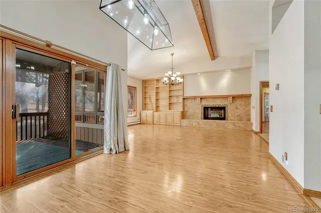 a view of a livingroom with a fireplace