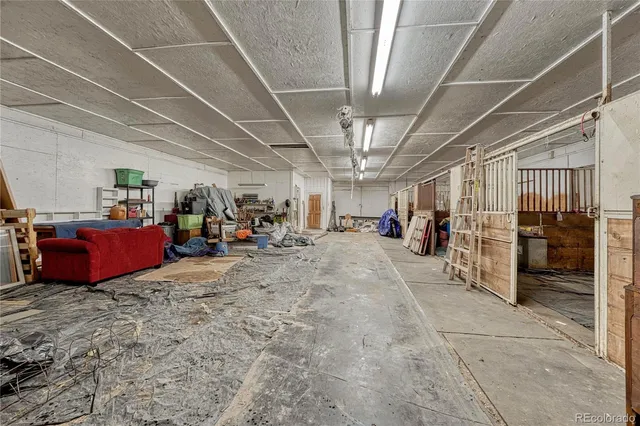 a view of a garage with furniture