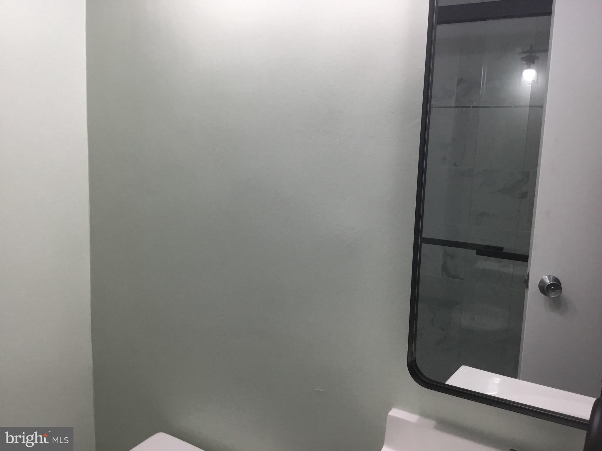 11609 Stoneview Square, Unit 11C Reston, VA 20191 - Photo 15 of 23 a bathroom with a shower
