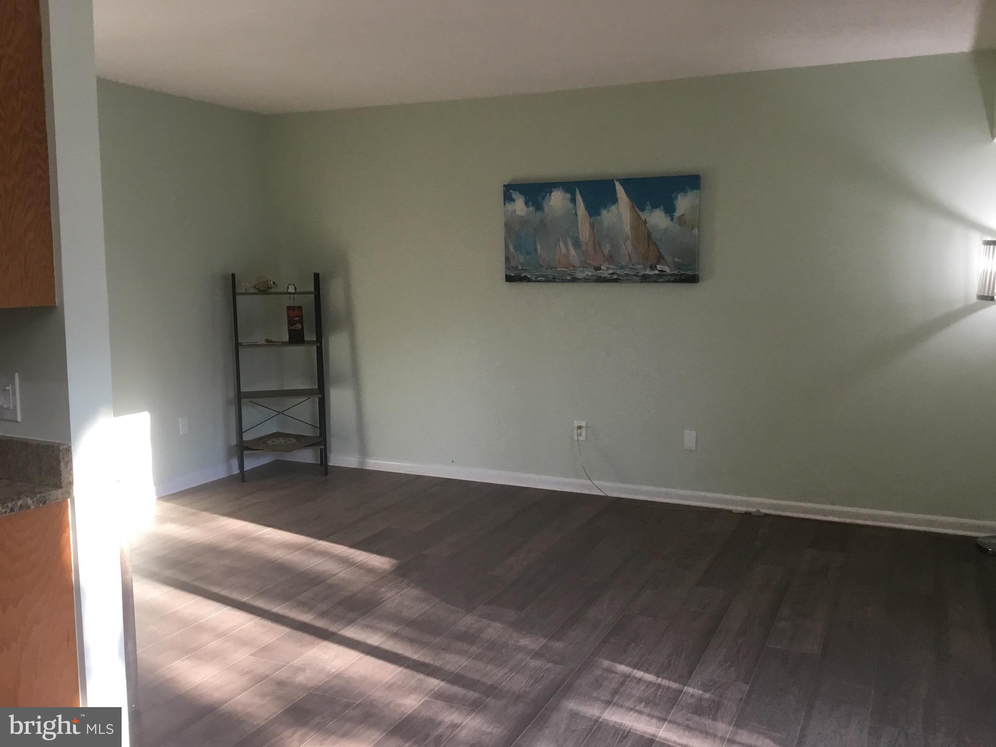11609 Stoneview Square, Unit 11C Reston, VA 20191 - Photo 23 of 23 a view of an empty room with a window