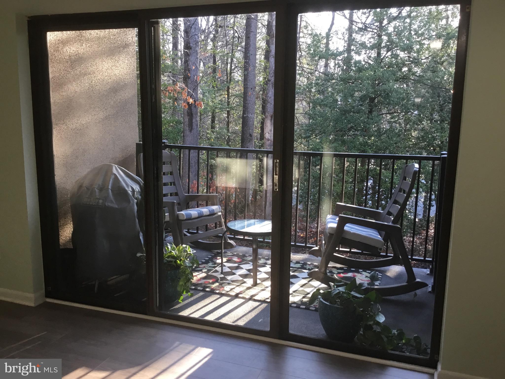 11609 Stoneview Square, Unit 11C Reston, VA 20191 - Photo 3 of 23 a view of a balcony with chairs