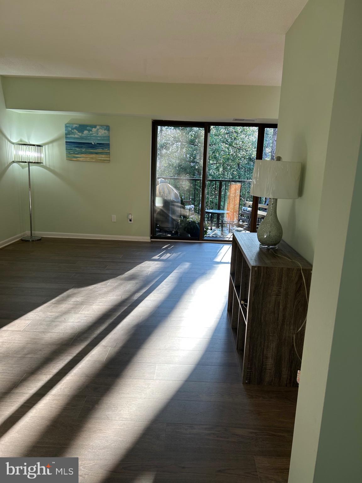 11609 Stoneview Square, Unit 11C Reston, VA 20191 - Photo 5 of 23 a living room with a large window