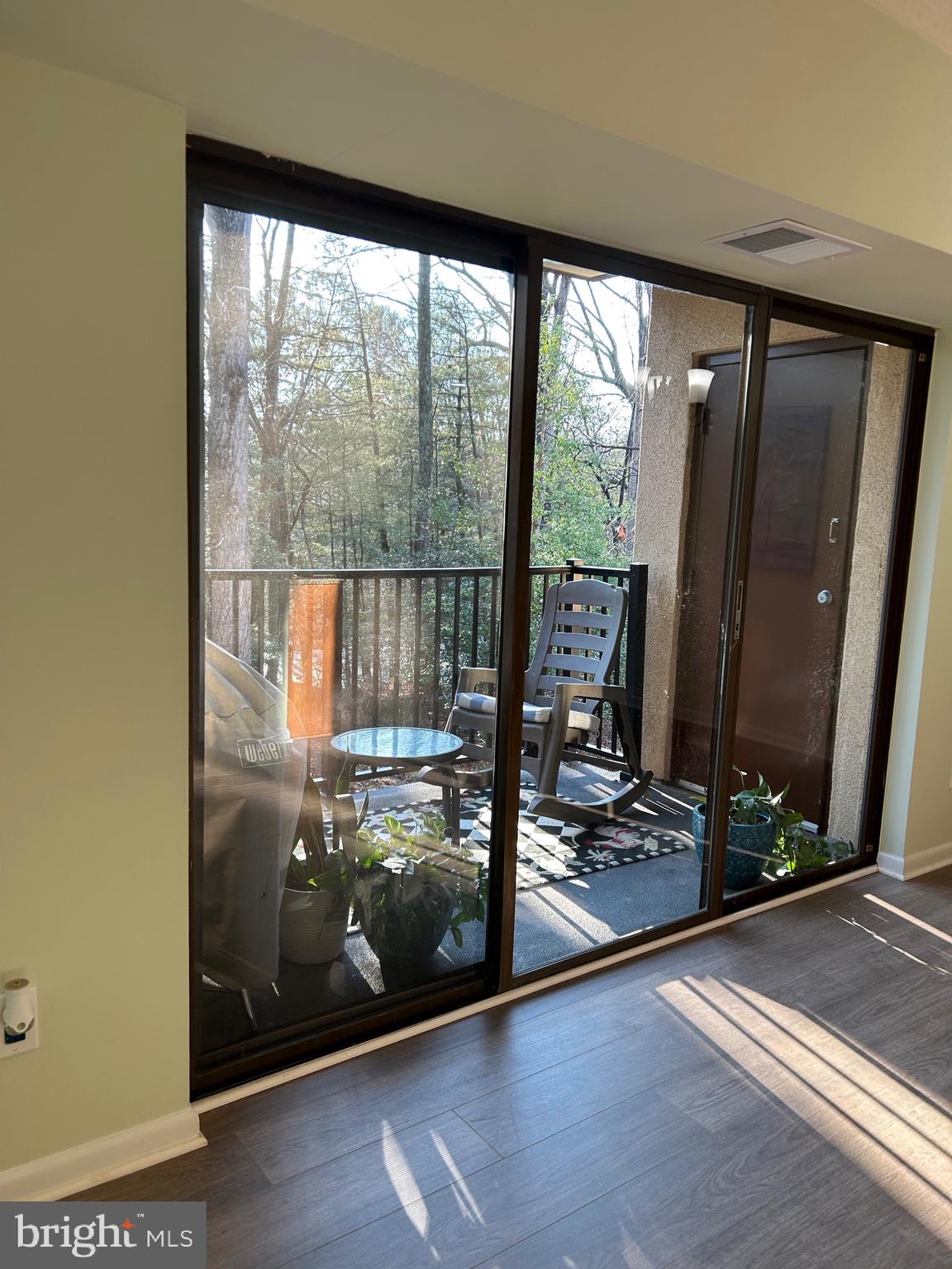 11609 Stoneview Square, Unit 11C Reston, VA 20191 - Photo 6 of 23 a view of water heater room with a floor to ceiling window