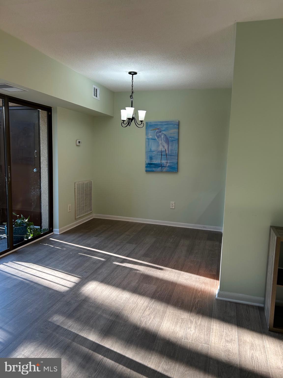 11609 Stoneview Square, Unit 11C Reston, VA 20191 - Photo 9 of 23 a view of a livingroom with a fireplace