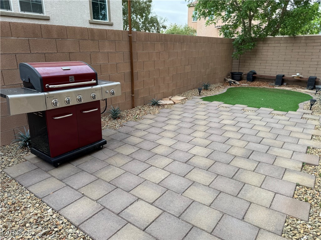 355 Gracious Way Henderson, NV 89011 - Photo 59 of 65 View of patio / terrace with fence and area for grilling