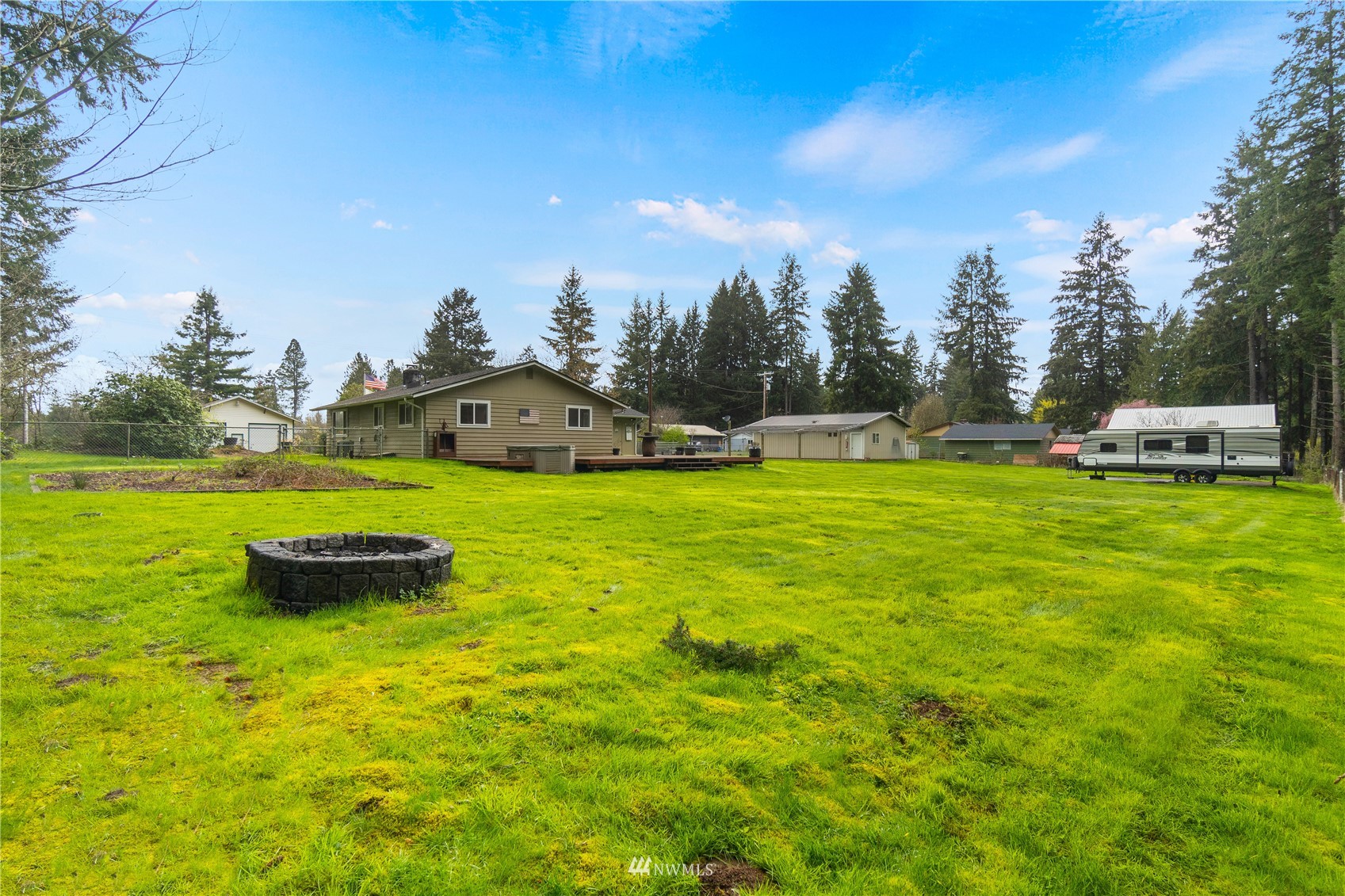 151 Fircrest Road Napavine, WA 98532 - Photo 20 of 28 a view of a swimming pool with a yard