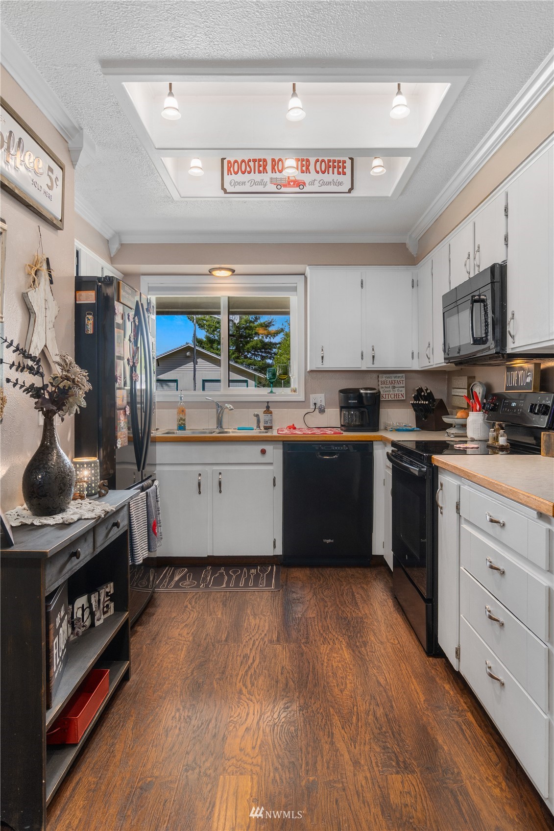 151 Fircrest Road Napavine, WA 98532 - Photo 5 of 28 a kitchen with stainless steel appliances granite countertop a sink cabinets and wooden floor