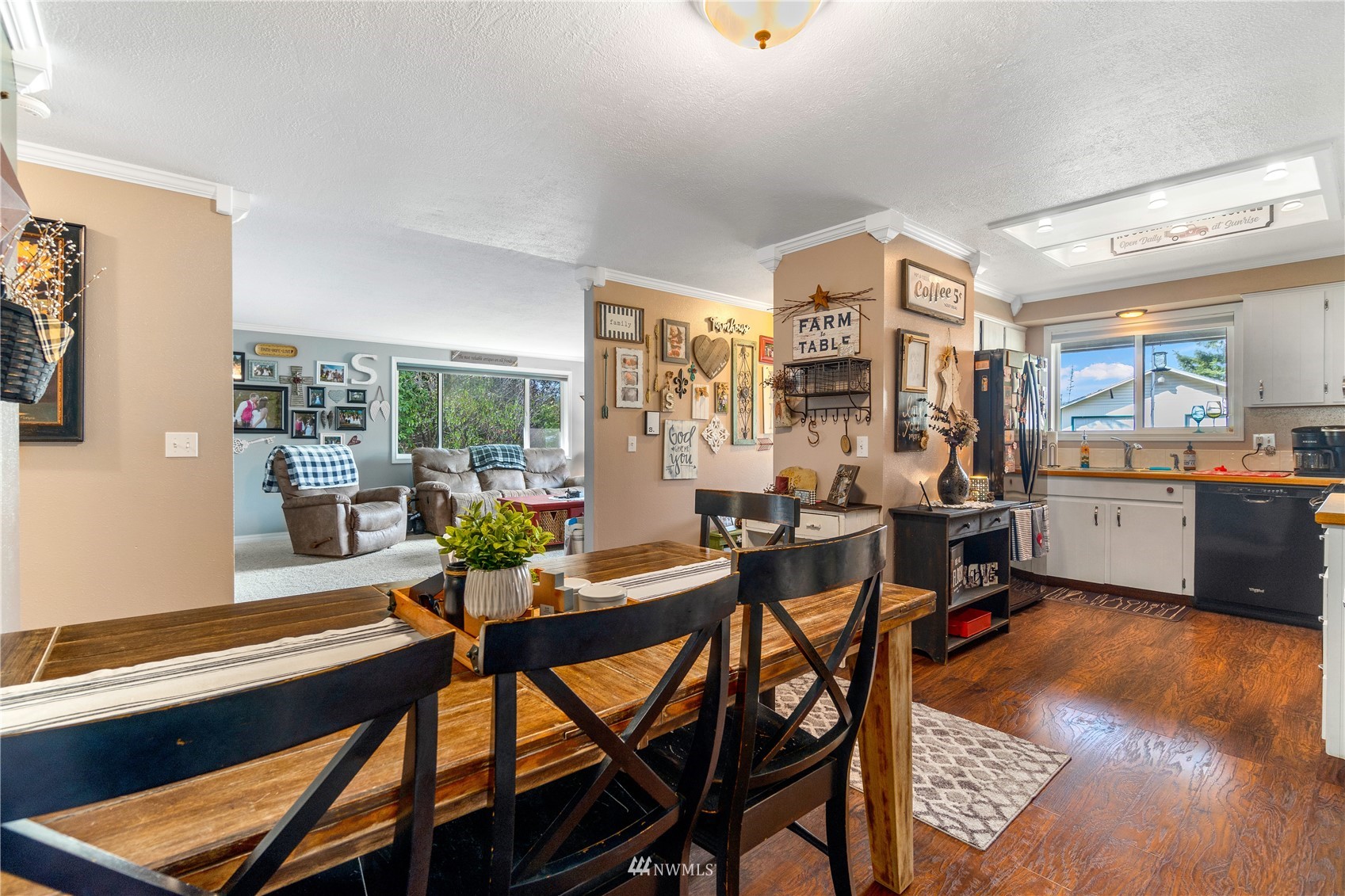 151 Fircrest Road Napavine, WA 98532 - Photo 7 of 28 a view of a dining room with furniture and wooden floor
