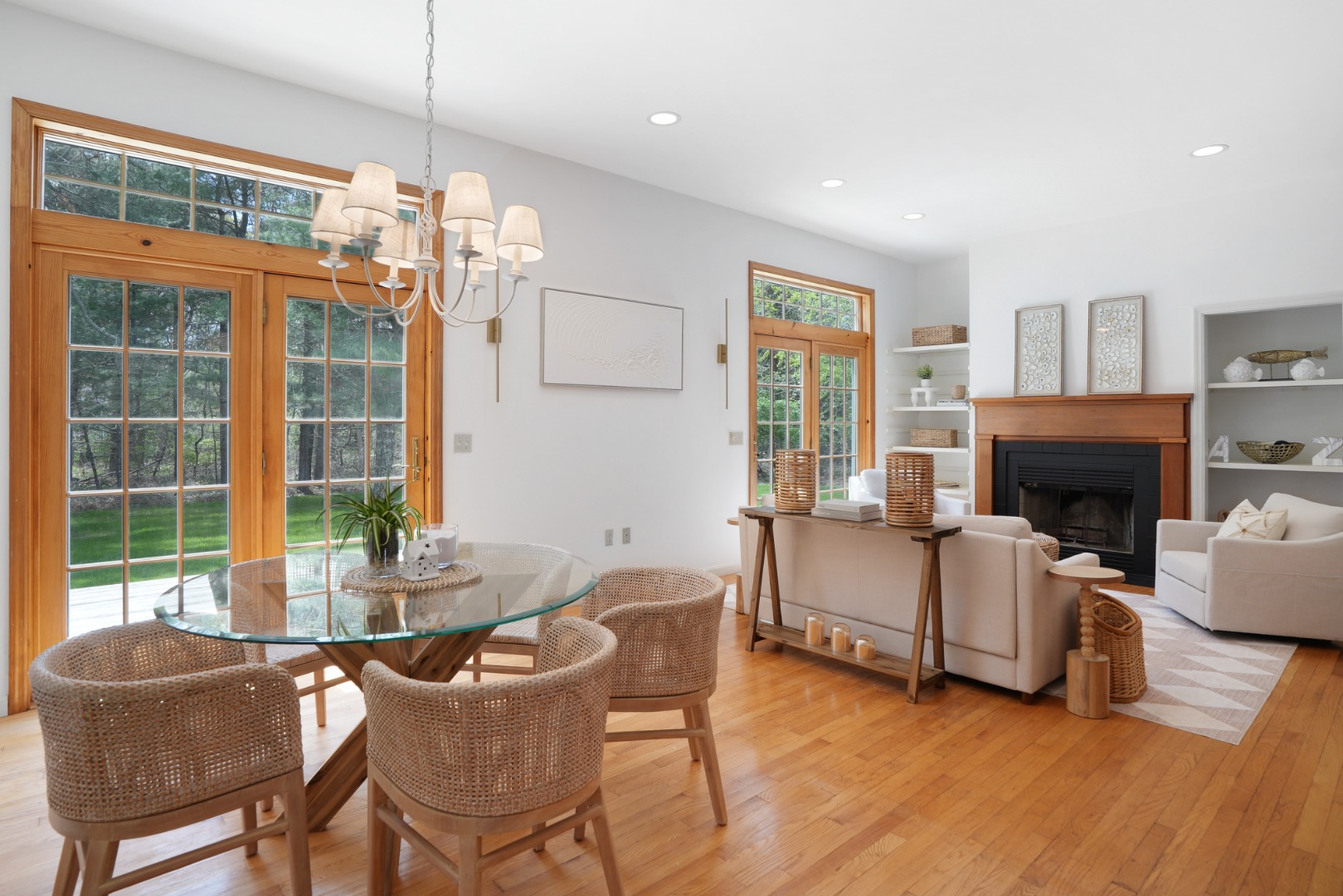 2 Cosmos Way Edgartown, MA 02539 - Photo 12 of 29 a dining room with furniture a fireplace and wooden floor