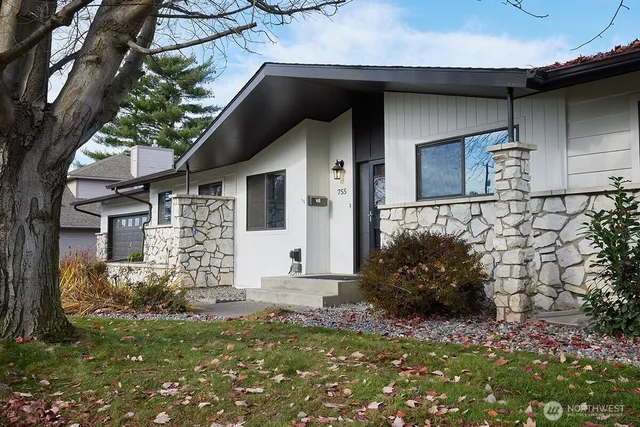 a house with trees in front of it