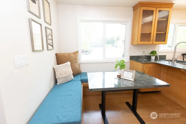 a view of a living room and dining room