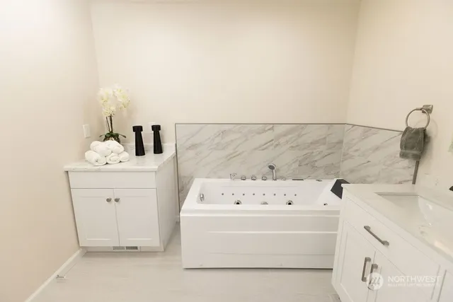 a bathroom with a sink and a bathtub