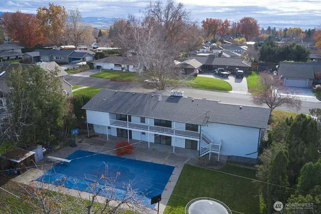 an aerial view of a house with a garden