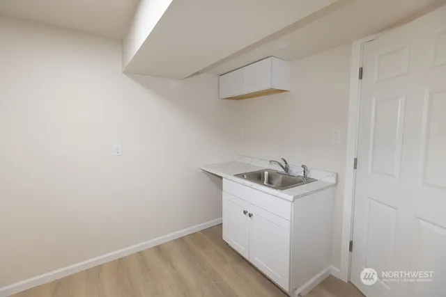 a utility room with a sink