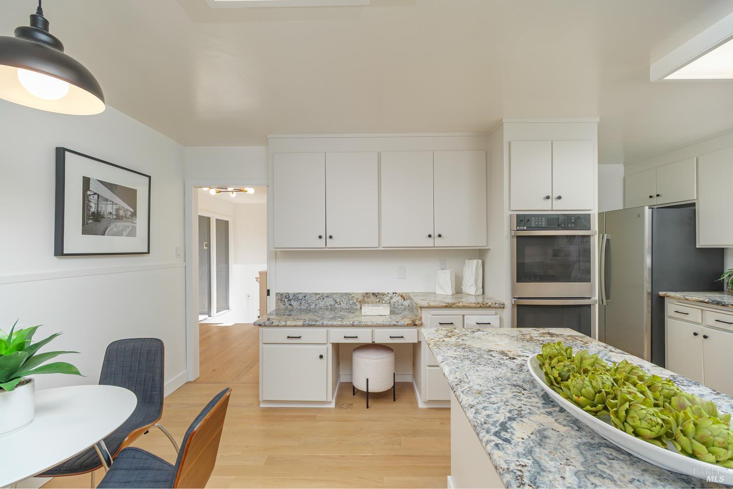9 Underhill Road Mill Valley, CA 94941 - Photo 12 of 27 a kitchen with granite countertop a stove a sink and a refrigerator