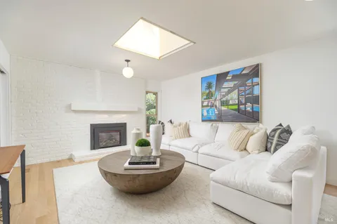 a bed room with a bed and a large window