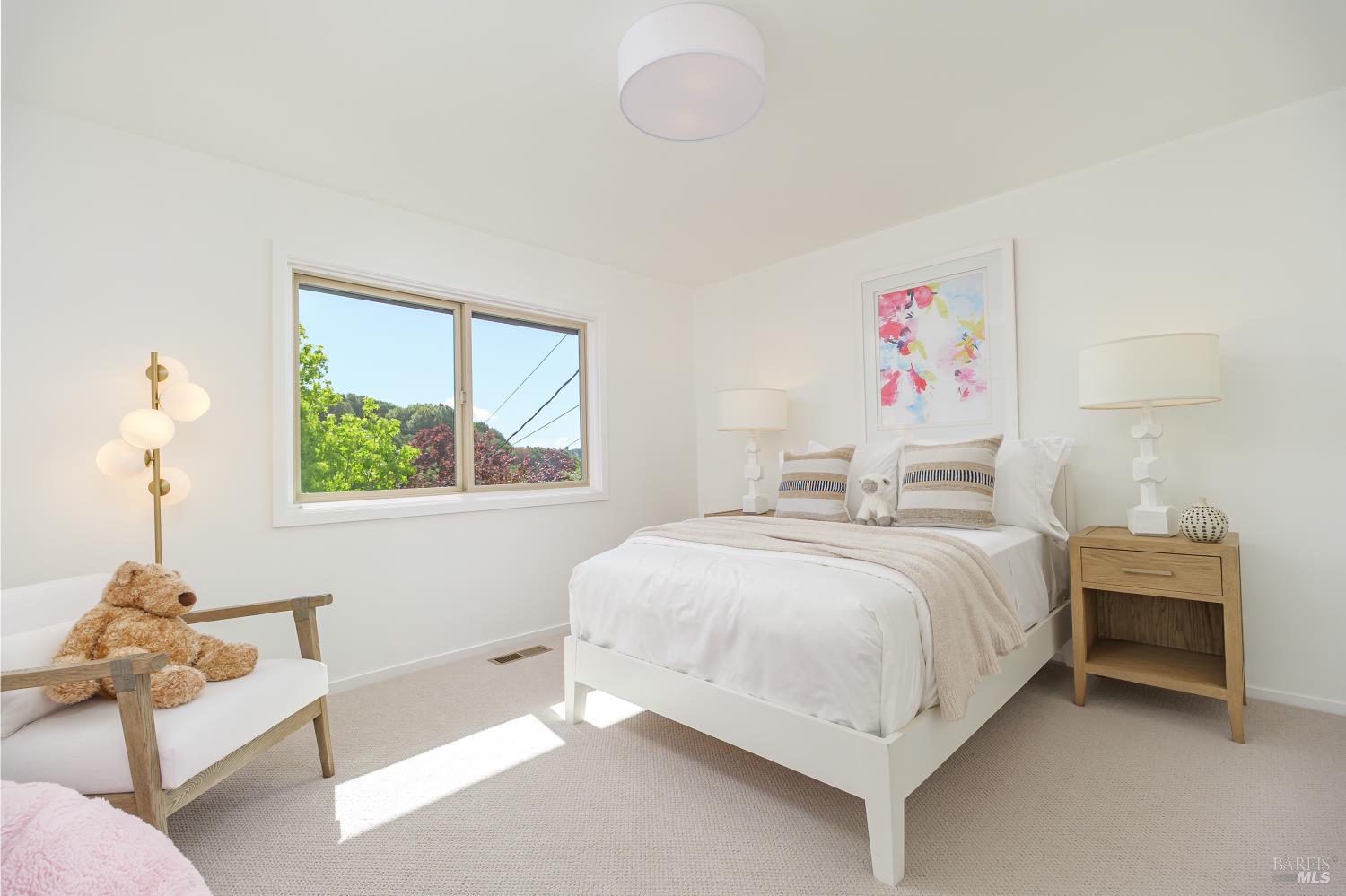 9 Underhill Road Mill Valley, CA 94941 - Photo 19 of 27 a bedroom with a bed and a window