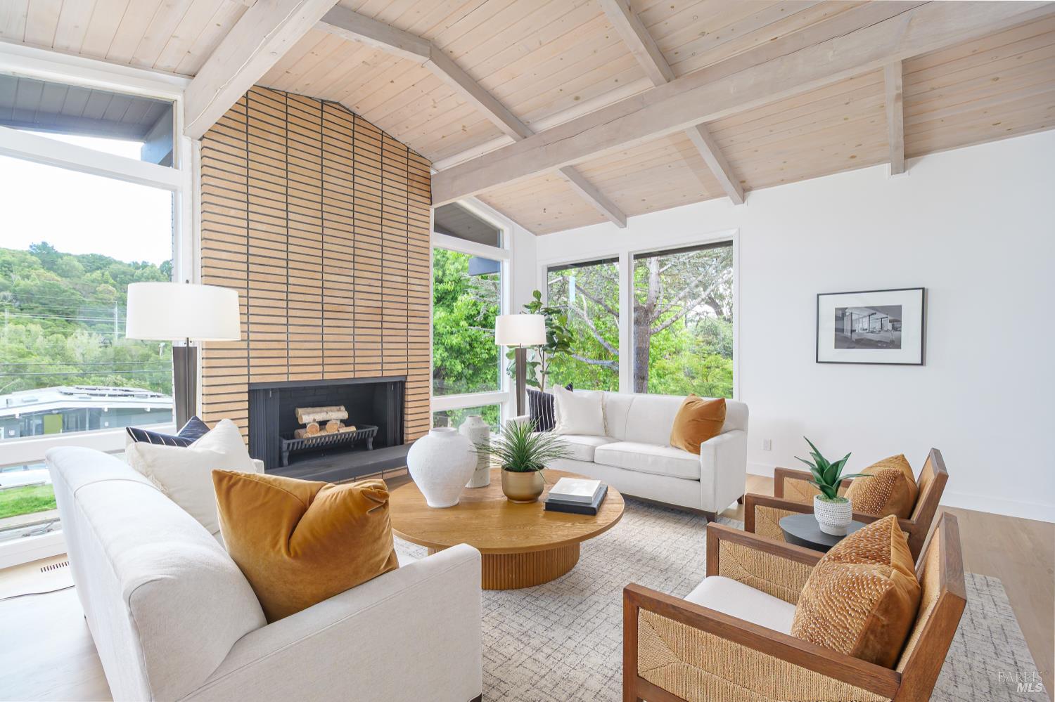 9 Underhill Road Mill Valley, CA 94941 - Photo 6 of 27 a living room with fireplace furniture and a large window