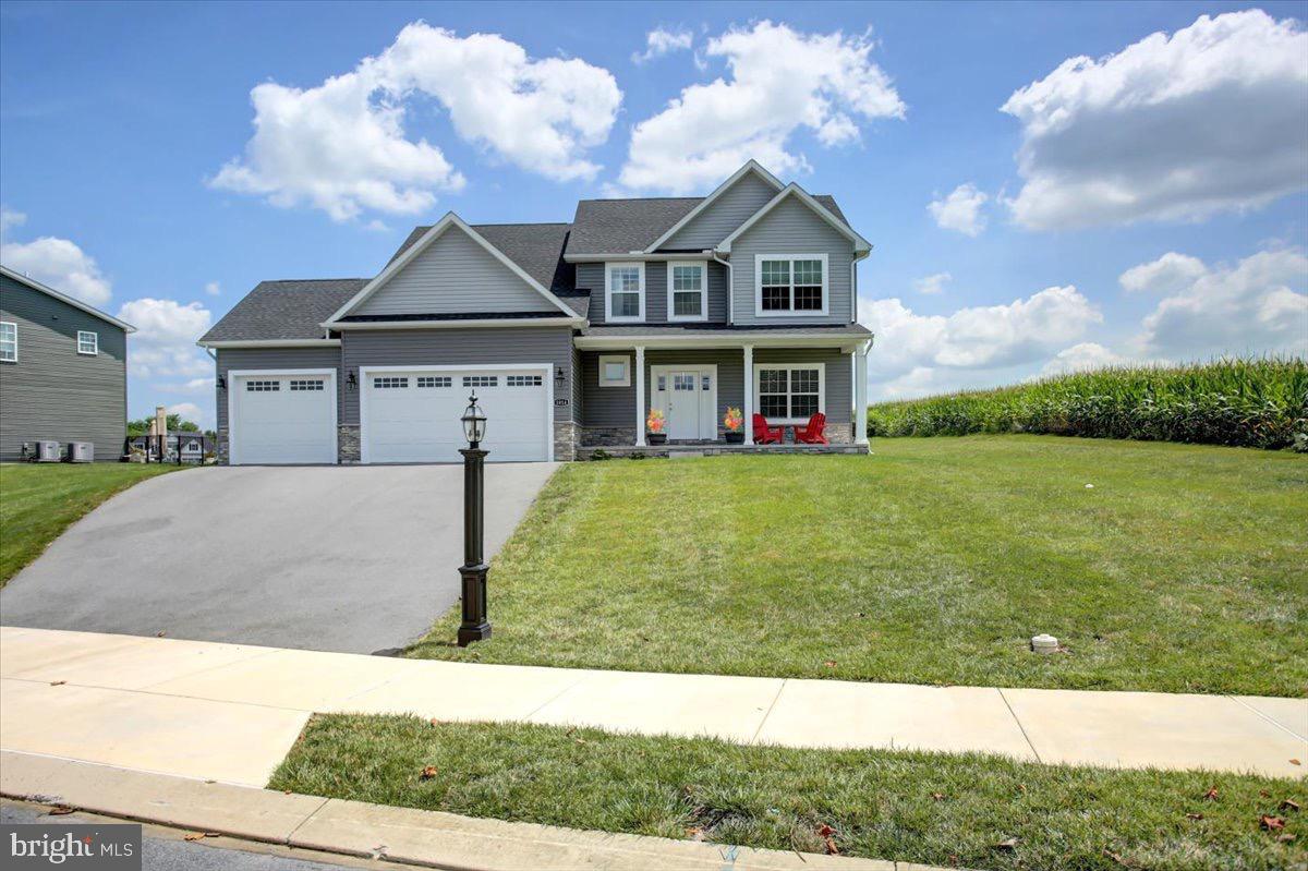 1014 Divinity Drive Greencastle, PA 17225 - Photo 2 of 56 a view of house with garden