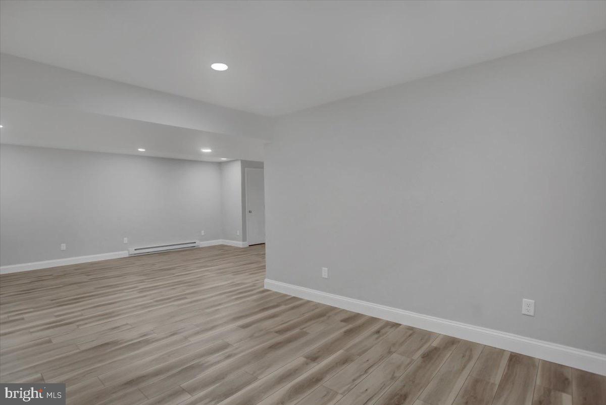 1014 Divinity Drive Greencastle, PA 17225 - Photo 39 of 56 a view of an empty room with wooden floor