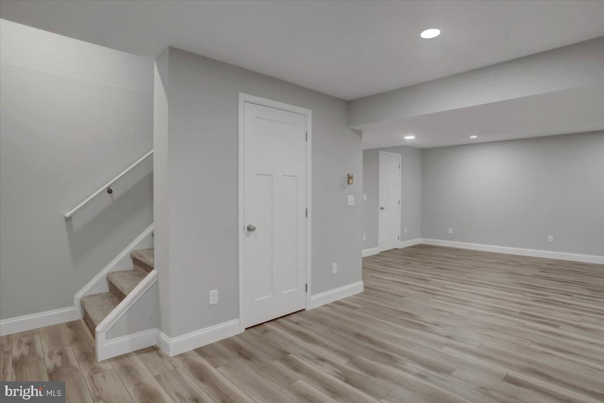 1014 Divinity Drive Greencastle, PA 17225 - Photo 40 of 56 a view of an empty room with wooden floor and entryway