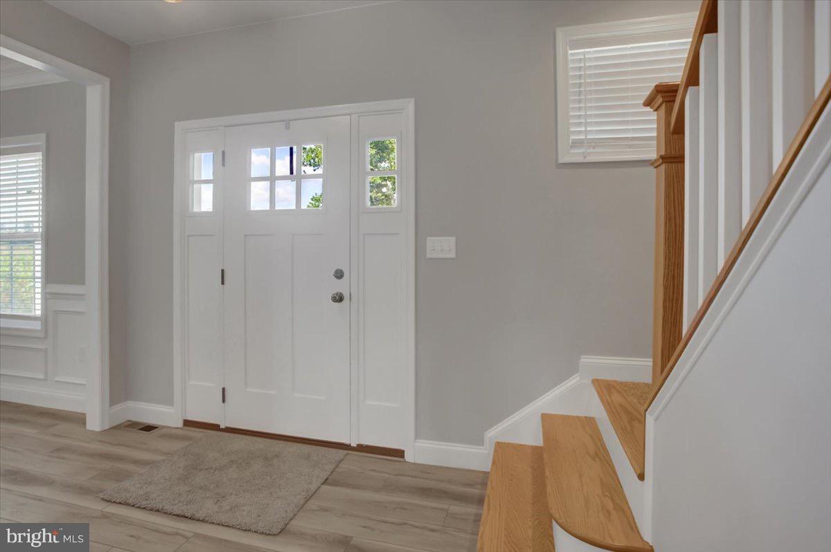 1014 Divinity Drive Greencastle, PA 17225 - Photo 6 of 56 a view of an entryway with wooden floor