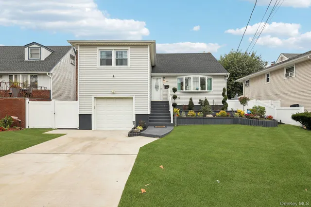 a front view of house with yard