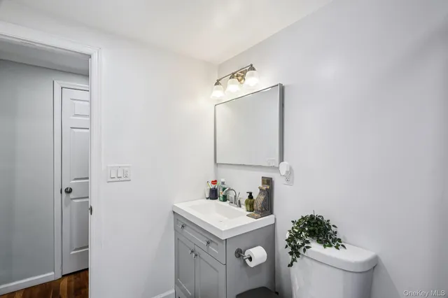 a bedroom with furniture and a baby crib
