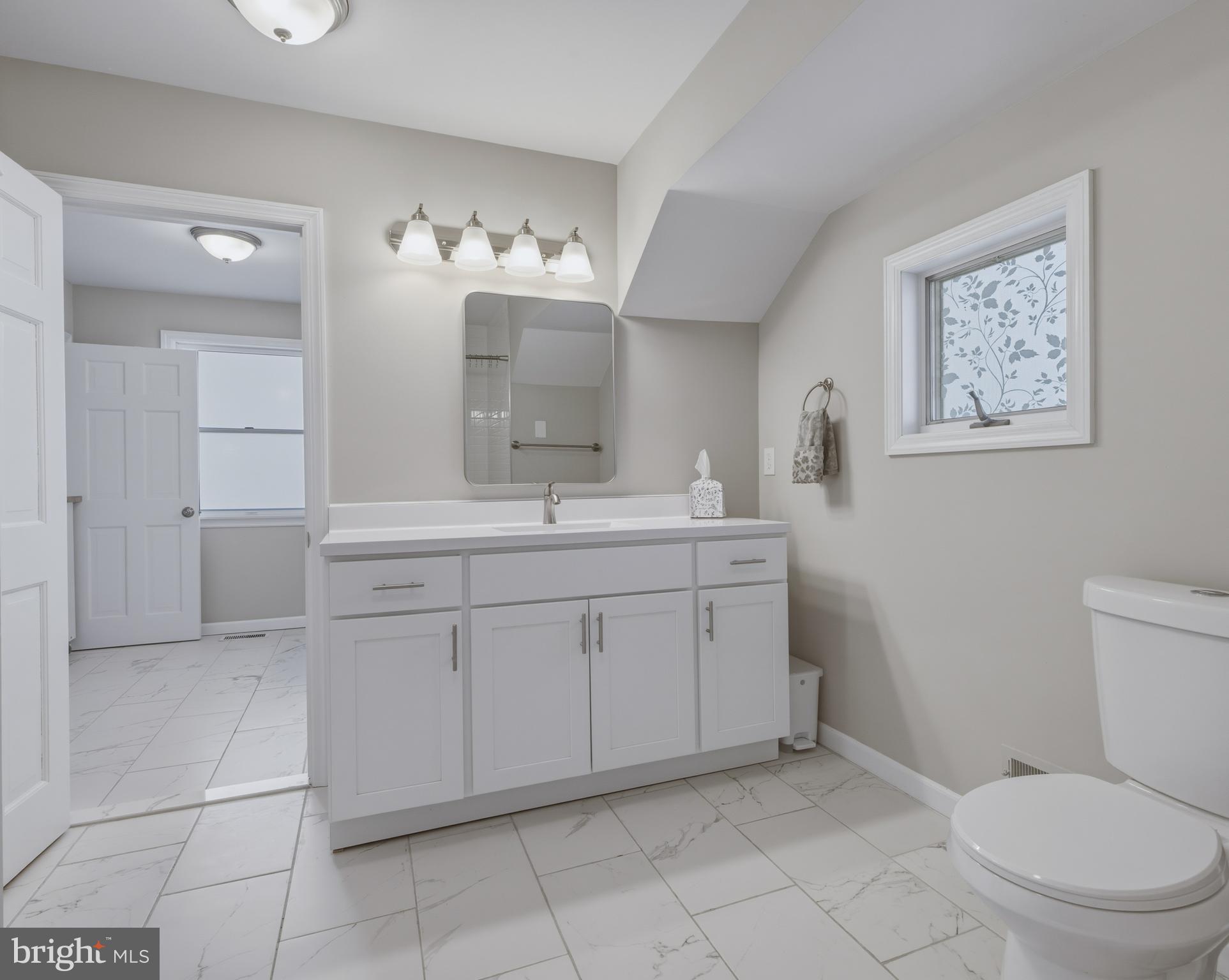 529 South Broadway Pitman, NJ 08071 - Photo 21 of 29 Beautiful white vanity & tile flooring