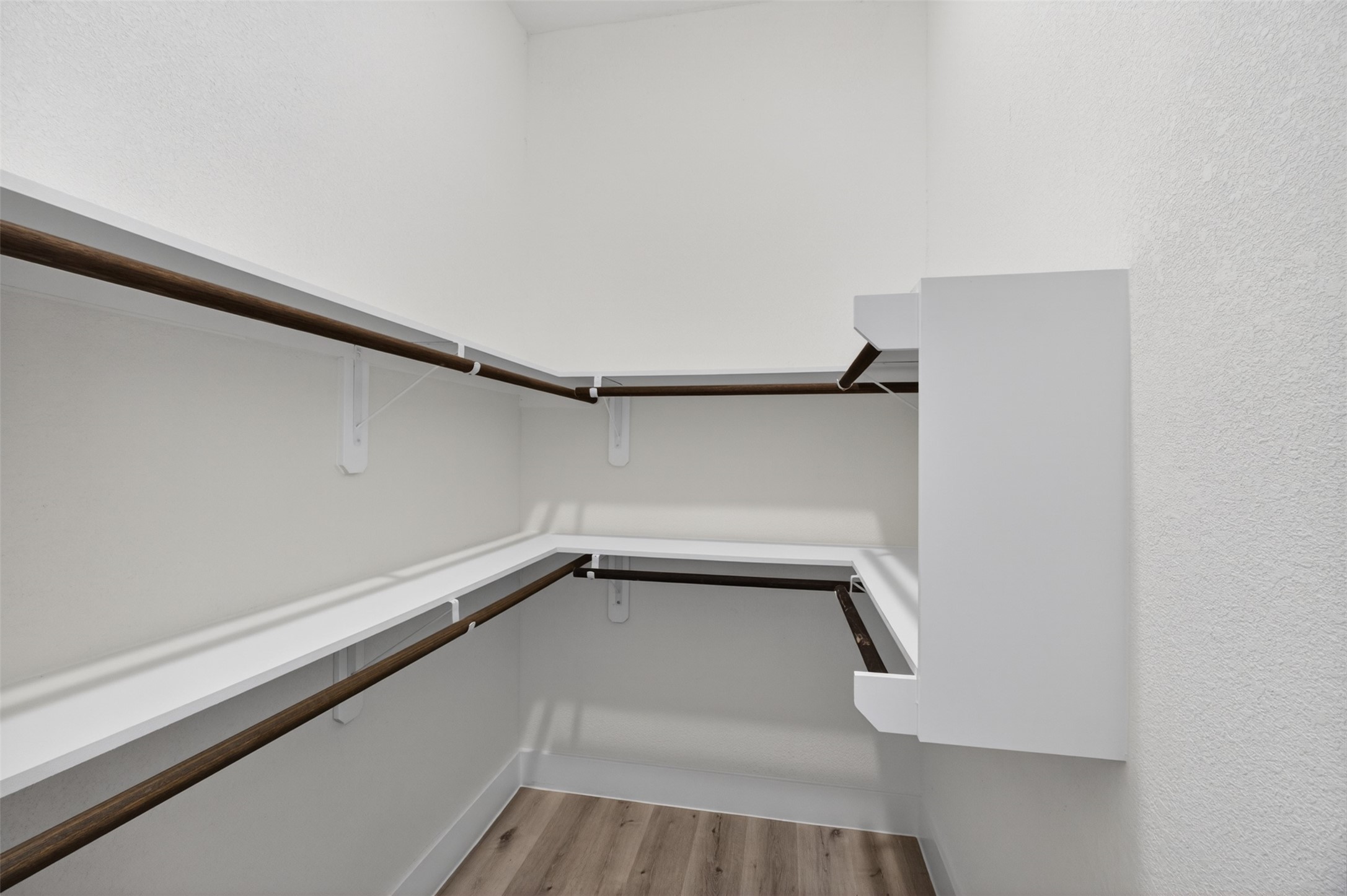5906 St Augustine Street, Unit F Houston, TX 77021 - Photo 25 of 34 Walk-in closet with wraparound hanging space and shelving.