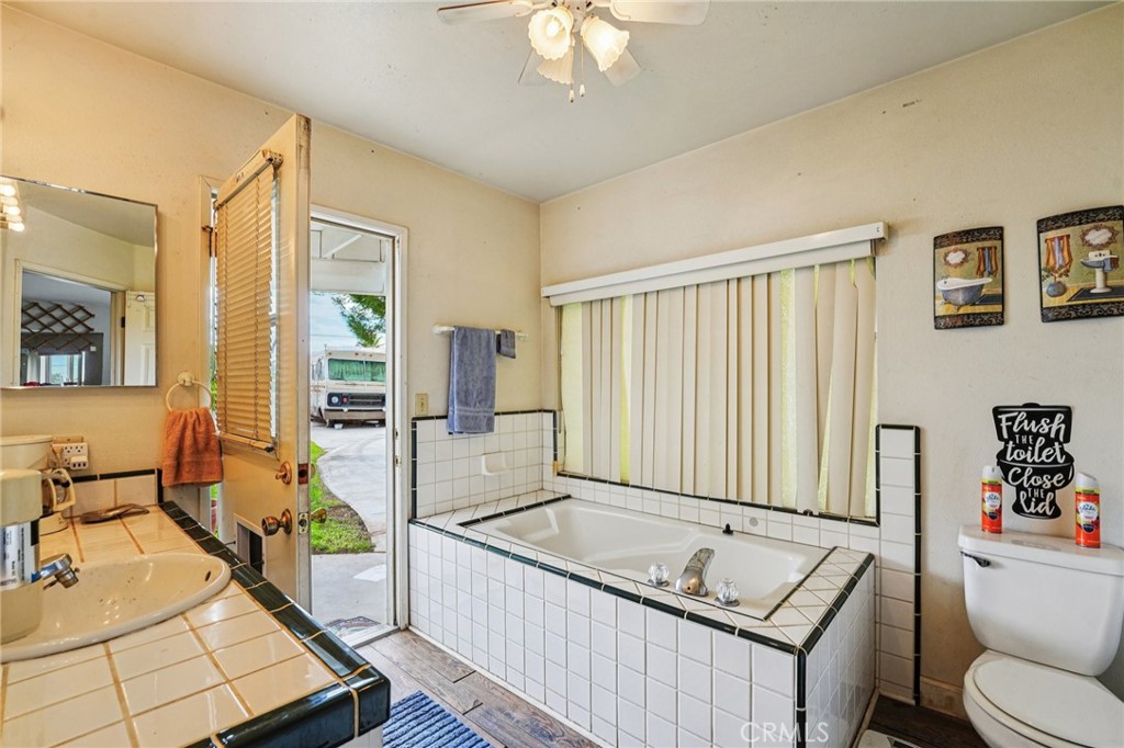 18947 Waseca Road Apple Valley, CA 92307 - Photo 12 of 34 a living room with furniture and a window