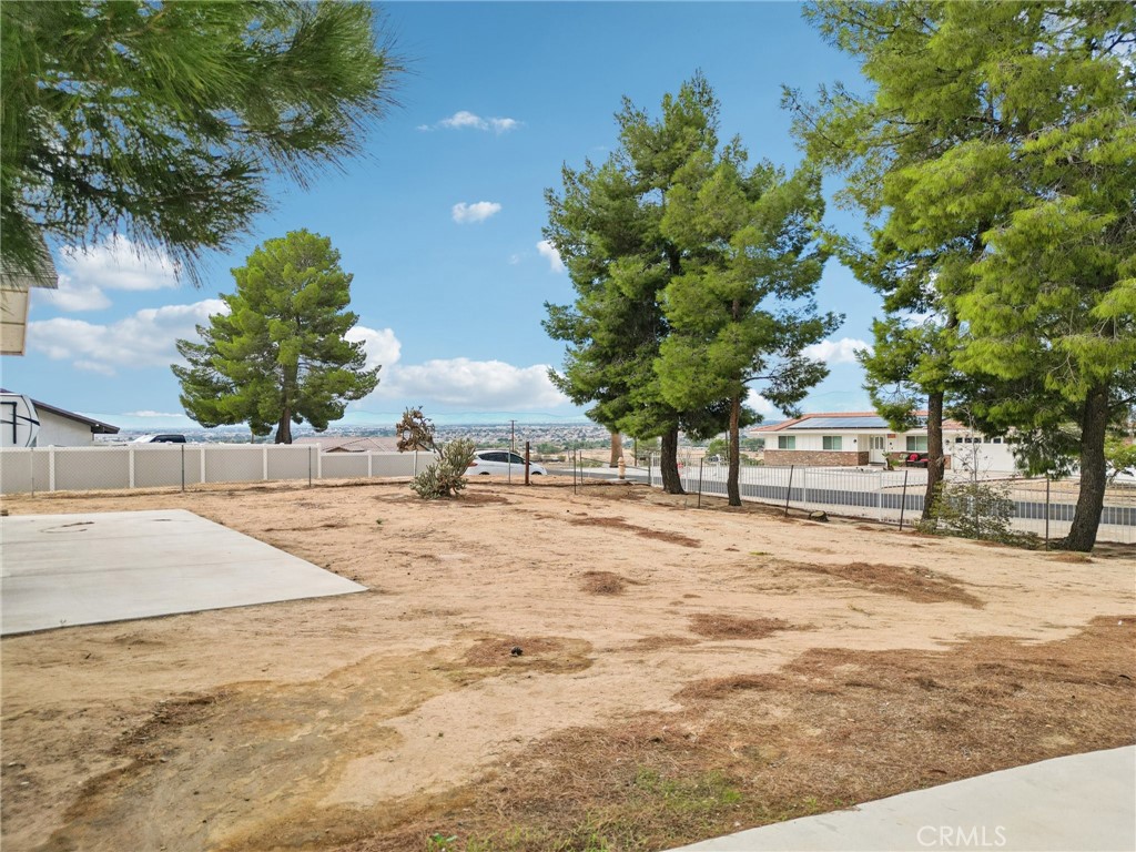 18947 Waseca Road Apple Valley, CA 92307 - Photo 27 of 34 a view of a backyard of a house