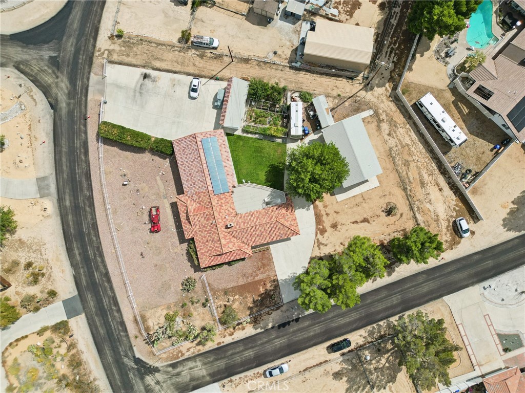 18947 Waseca Road Apple Valley, CA 92307 - Photo 32 of 34 an aerial view of a house with a garden