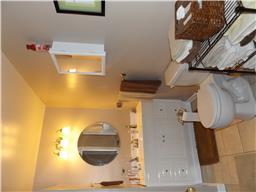 2156 River Road Clarksville, TN 37040 - Photo 14 of 17 a bathroom with a sink and a mirror