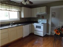 2156 River Road Clarksville, TN 37040 - Photo 3 of 17 a kitchen that has a sink and a stove