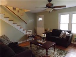 2156 River Road Clarksville, TN 37040 - Photo 6 of 17 a living room with furniture and wooden floor