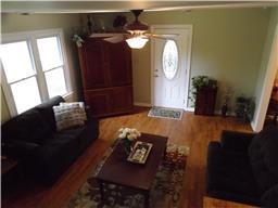 2156 River Road Clarksville, TN 37040 - Photo 7 of 17 a living room with furniture and a mirror