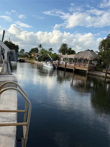 a view of a lake with a sitting space