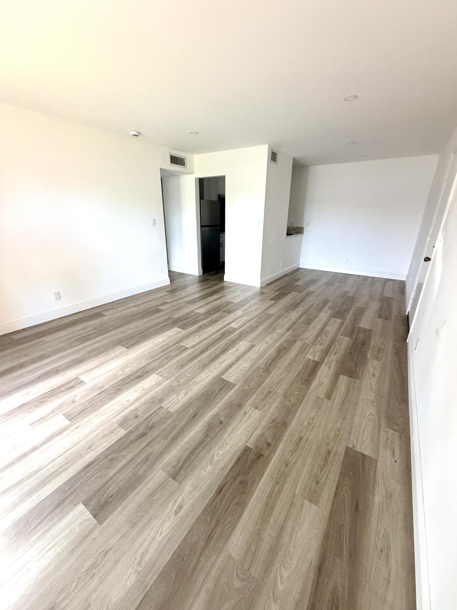 1766 Abbey Road, Unit 105 West Palm Beach, FL 33415 - Photo 6 of 8 ___F105 living 1