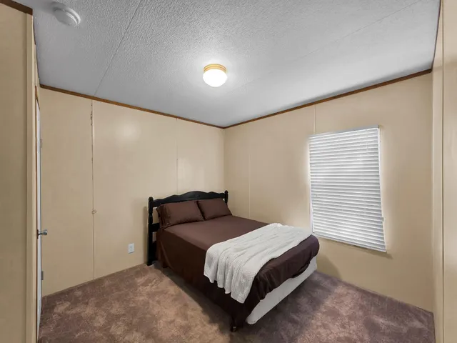 a bathroom with a sink vanity and mirror