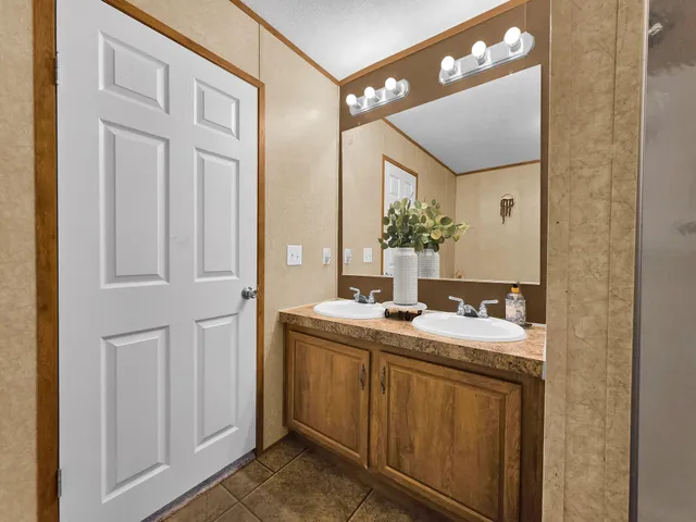 a bathroom with a tub and shower