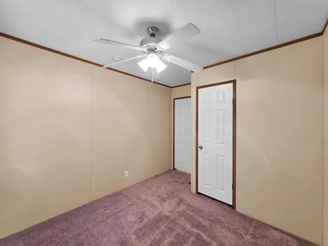 a balcony view with a large window