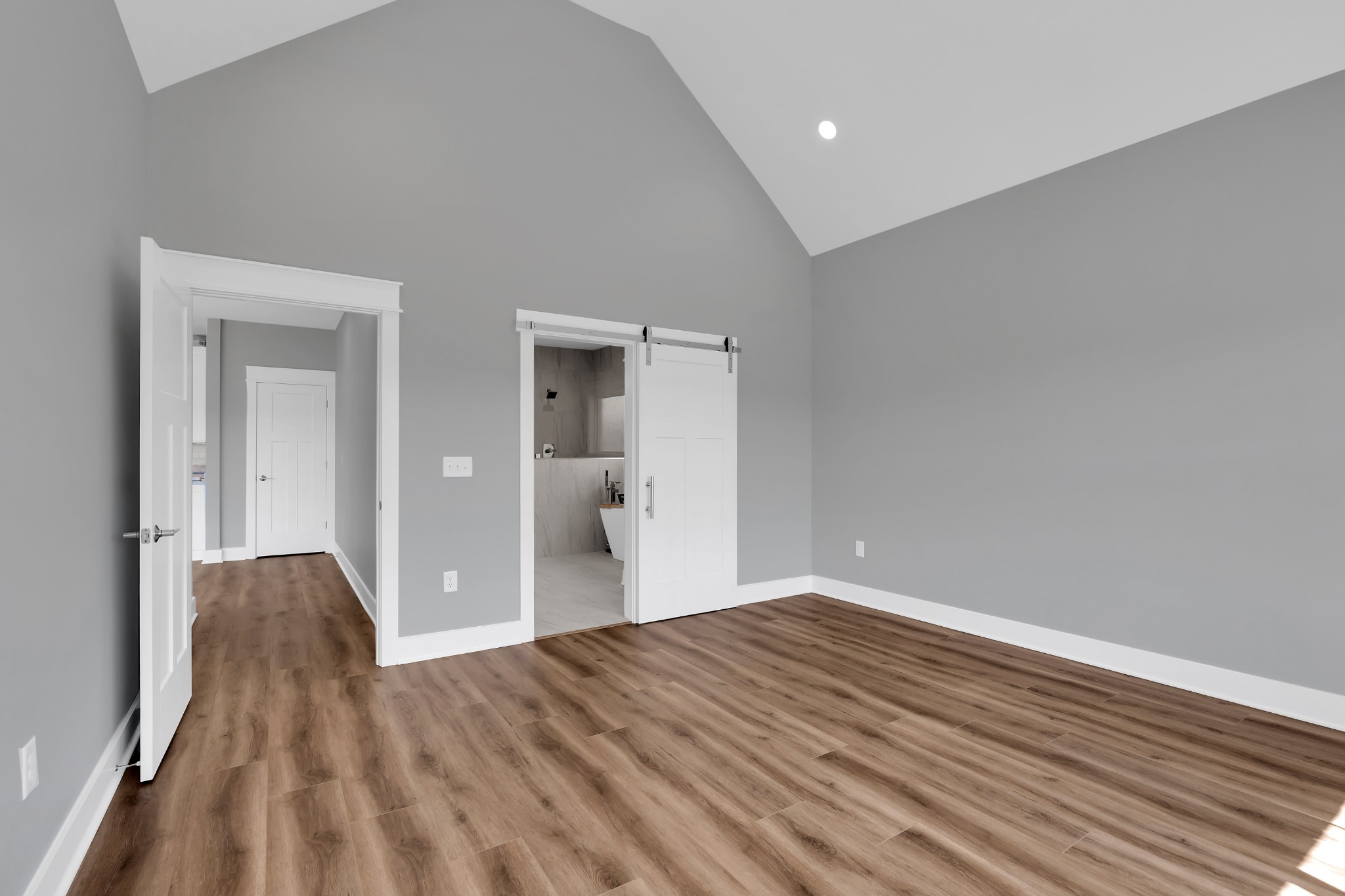 8246 Aedc Road Estill Springs, TN 37330 - Photo 28 of 55 a view of a room with wooden floor and bathroom