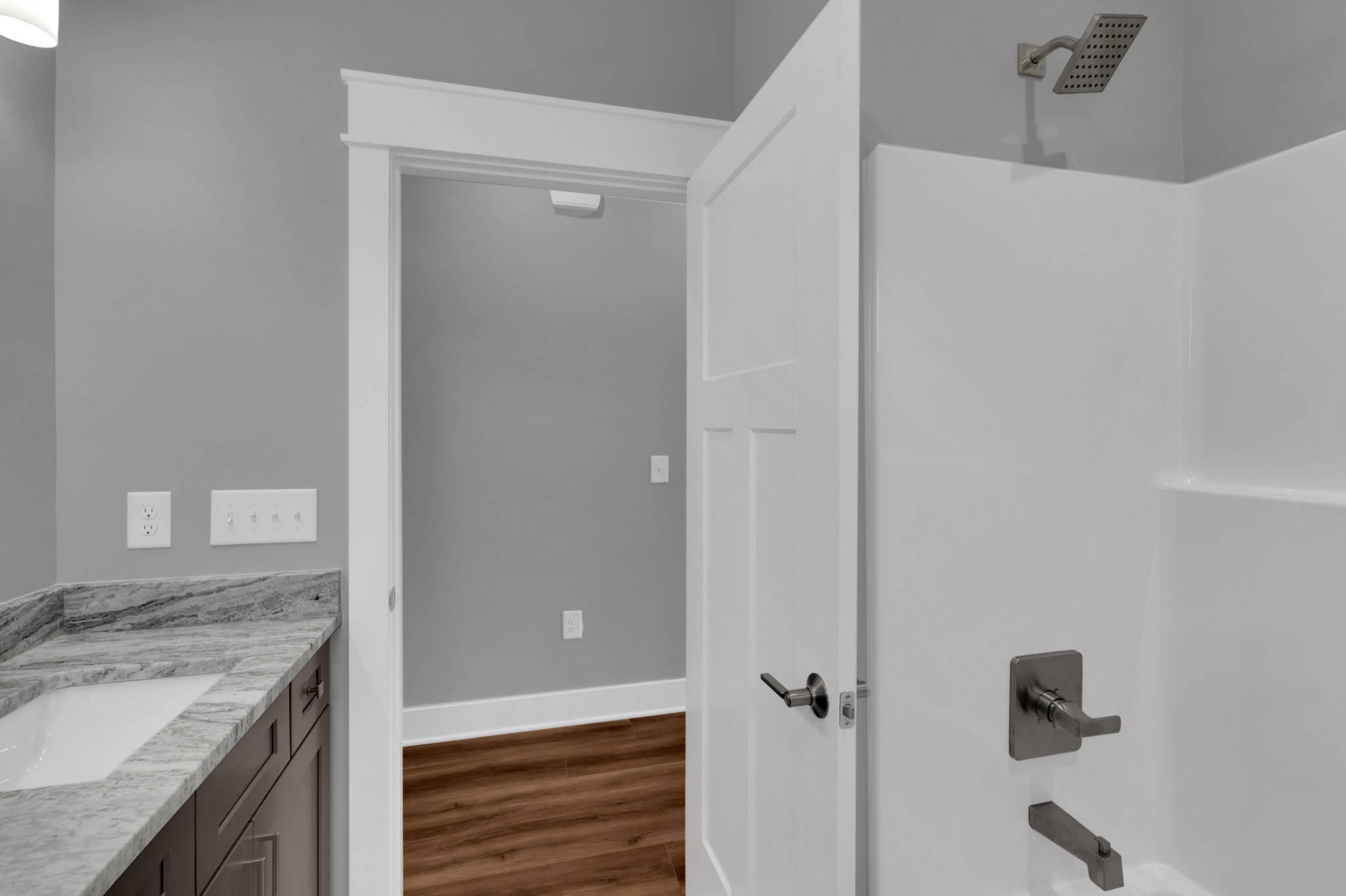 8246 Aedc Road Estill Springs, TN 37330 - Photo 41 of 55 a bathroom with a granite countertop sink and a mirror