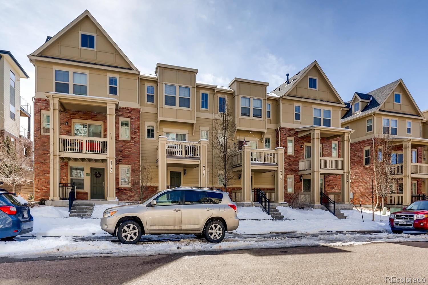 9520 Halstead Lane Lone Tree, CO 80124 - Photo 1 of 20 a car parked in front of a house