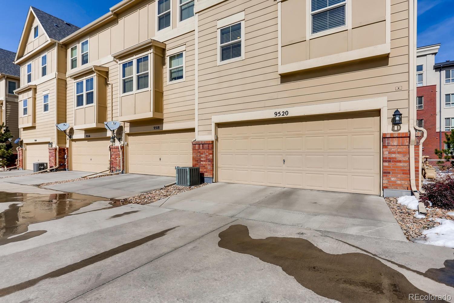 9520 Halstead Lane Lone Tree, CO 80124 - Photo 17 of 20 a front view of a house with a road
