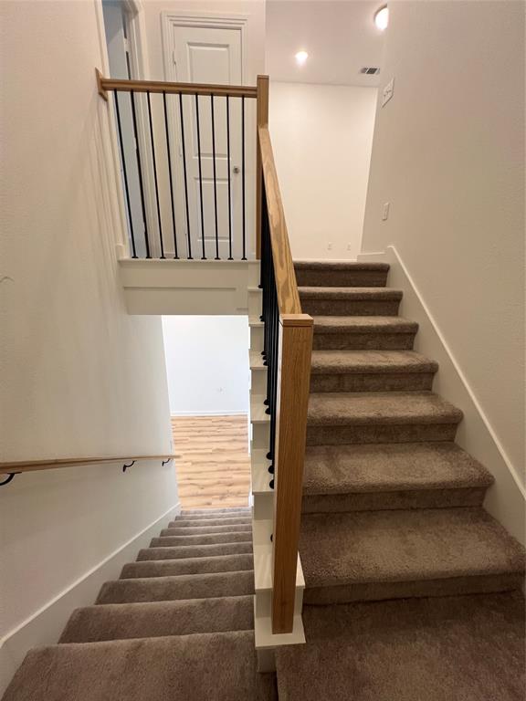 3708 Queen Road Sherman, TX 75090 - Photo 10 of 30 Stairway with dark colored carpet