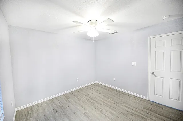 a bathroom with a sink a mirror and shower